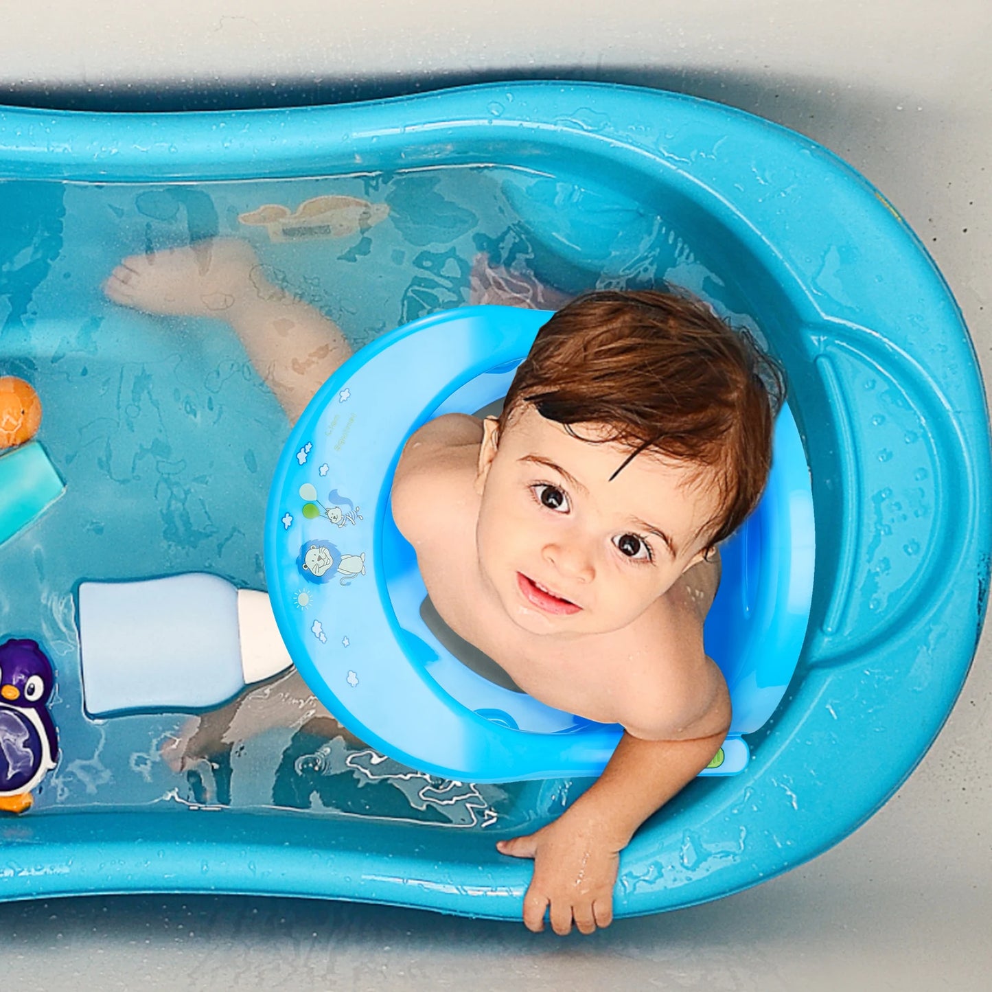 Kid using the newborn baby bath stool